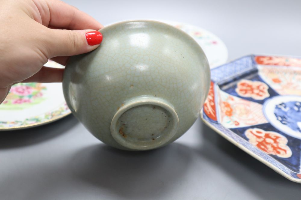 A Chinese celadon bowl, diameter 14cm, an Imari plate and two Chinese plates